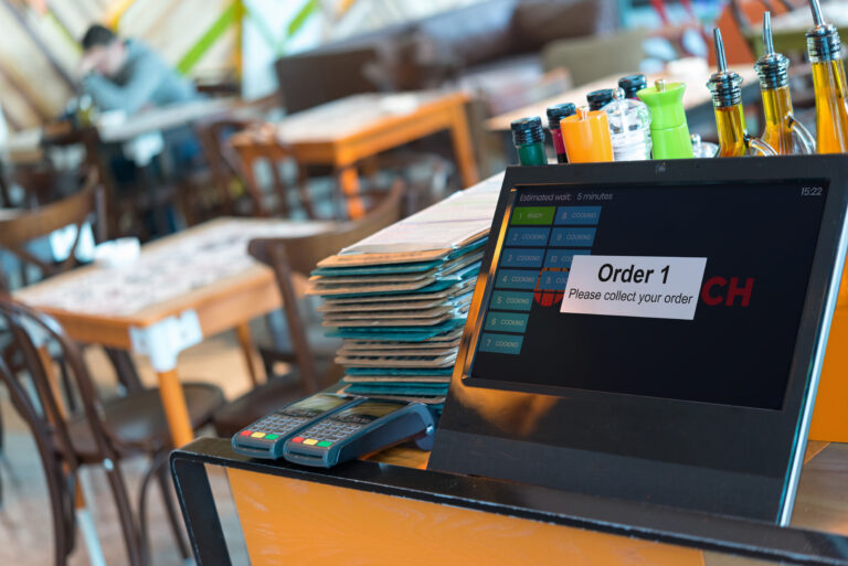 Point of sale, POS , table credit card terminal in modern restaurant